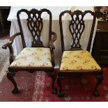 Set of 8 Chippendale style chairs on ball and claw feet to include 2 carvers