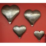 Set of 4 oil can sculpture heart wall hangings