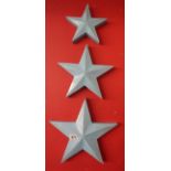 3 graduated oil can sculpture stars