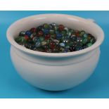 Chamber pot full of marbles