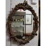 Oval gilt framed mirror