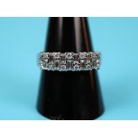 Fine 18ct white gold ring set with baguette & brilliant cut diamond