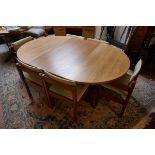 Gordon Russel round table and 6 chairs to inc. 2 carvers