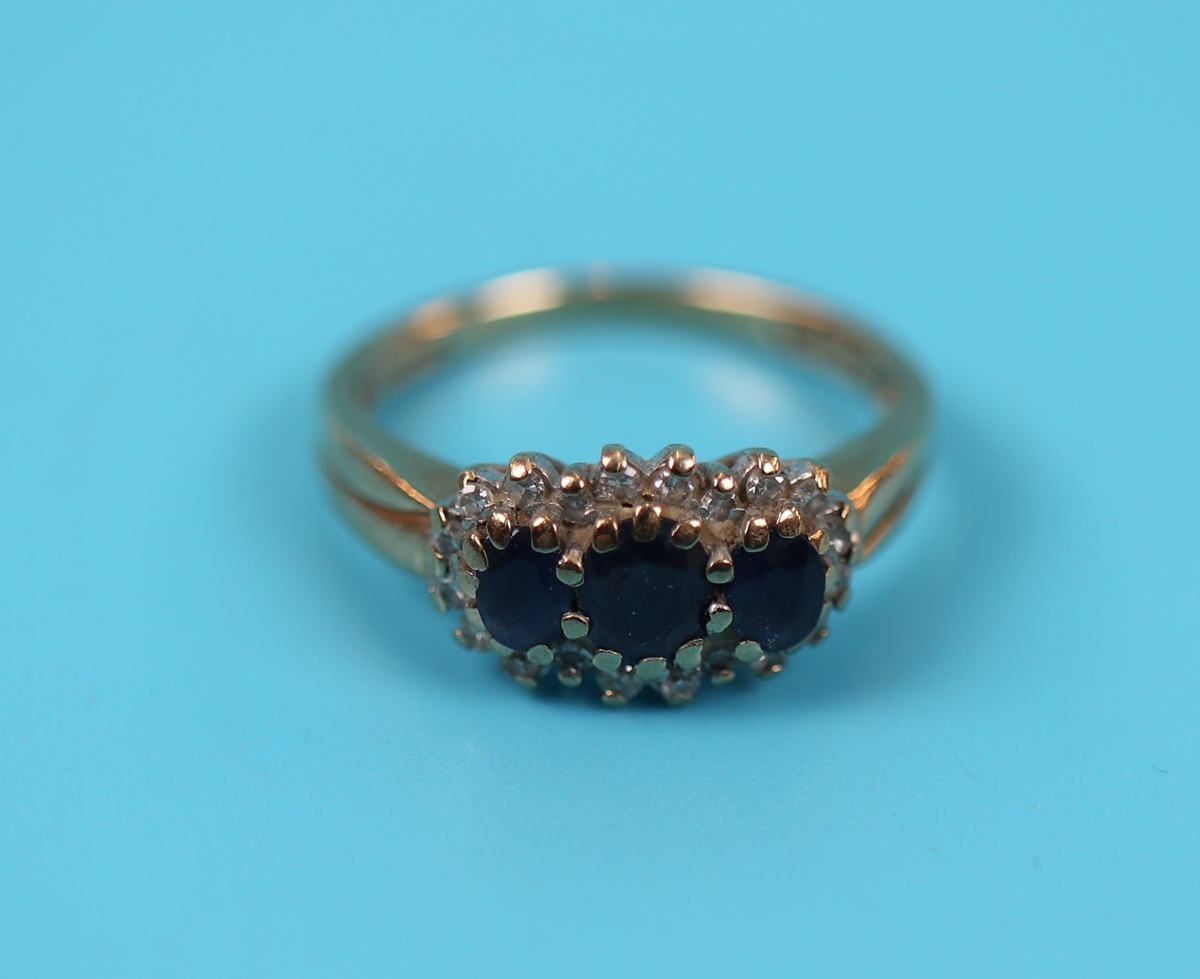 Gold diamond & sapphire triple cluster ring