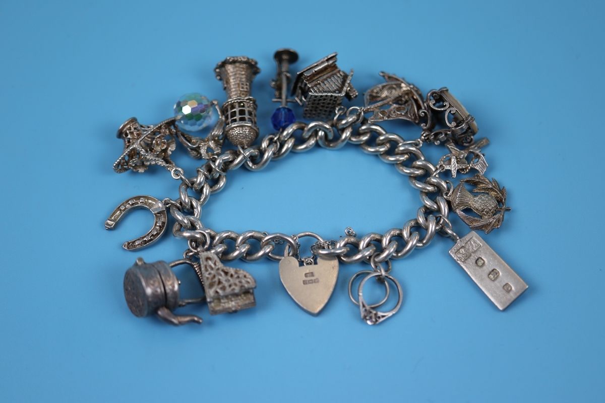 Heavy silver charm bracelet