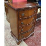 Small serpentine front chest of 4 drawers