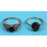 2 gold stone set rings