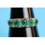 Gold emerald & diamond ring