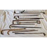 Collection of sticks & hickory shafted golf clubs etc