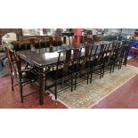 Very large Chinese themed dining table and 14 matching chairs to include 2 carvers (all with
