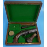 Cased antique pepper pot pistol with powder flask