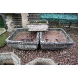 Pair of stone square planters and another