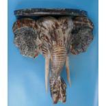 Wooden elephant head shelf