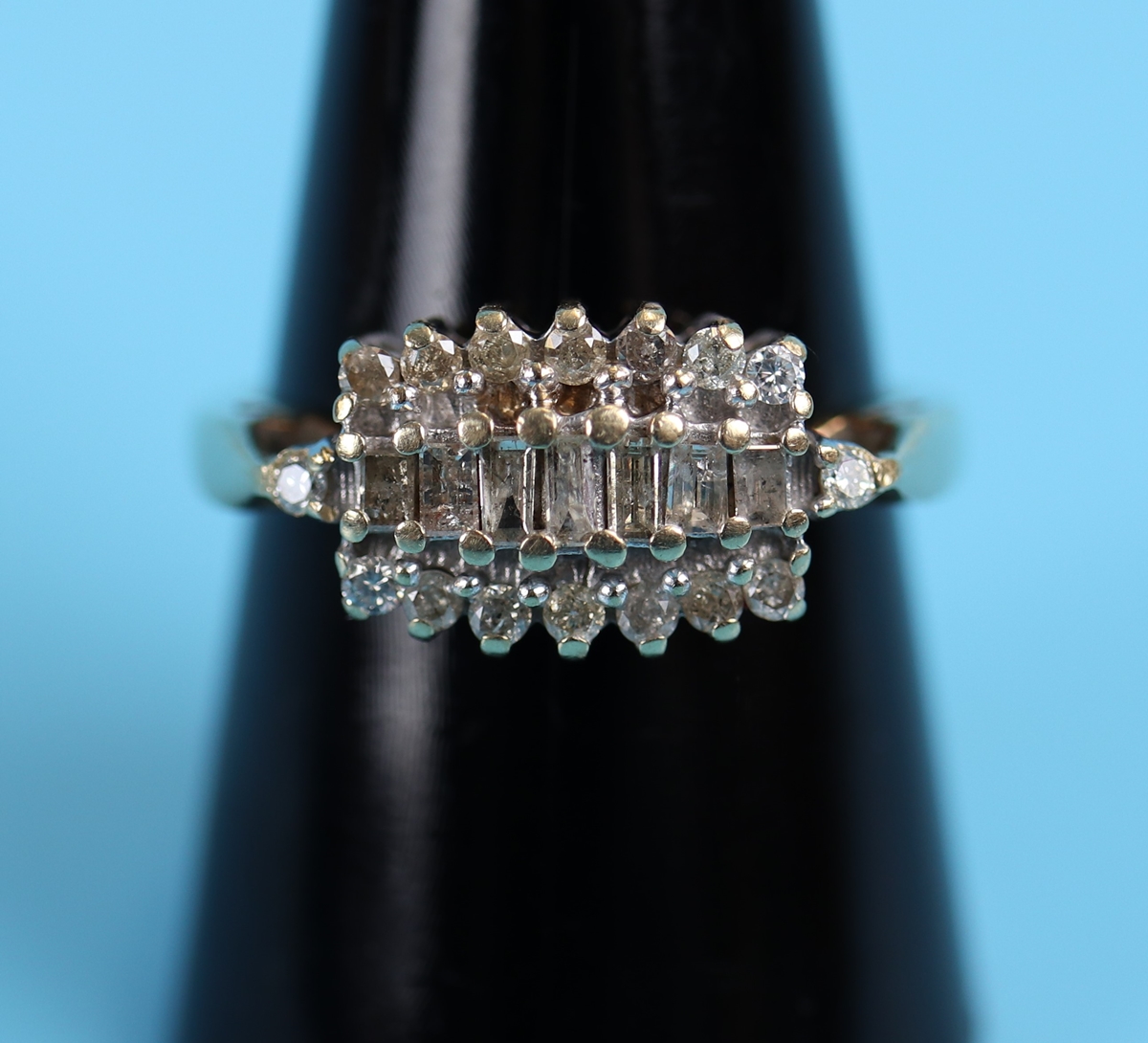 Gold baguette diamond set ring