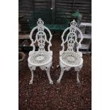 Pair of metal bistro chairs