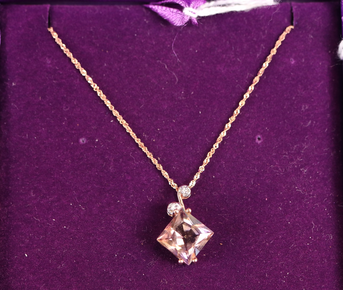 Gold amethyst & diamond pendant on gold chain