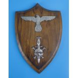 2 Nazi insignia badges mounted on wooden shield
