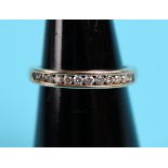 Gold channel set diamond ring