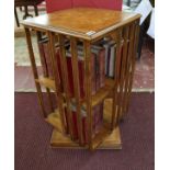 Revolving burr walnut bookcase