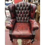 Oxblood wingback armchair