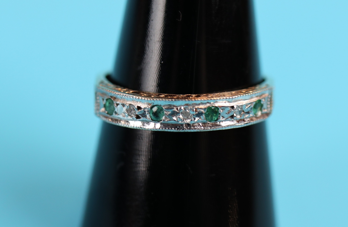 Gold emerald & diamond set ring