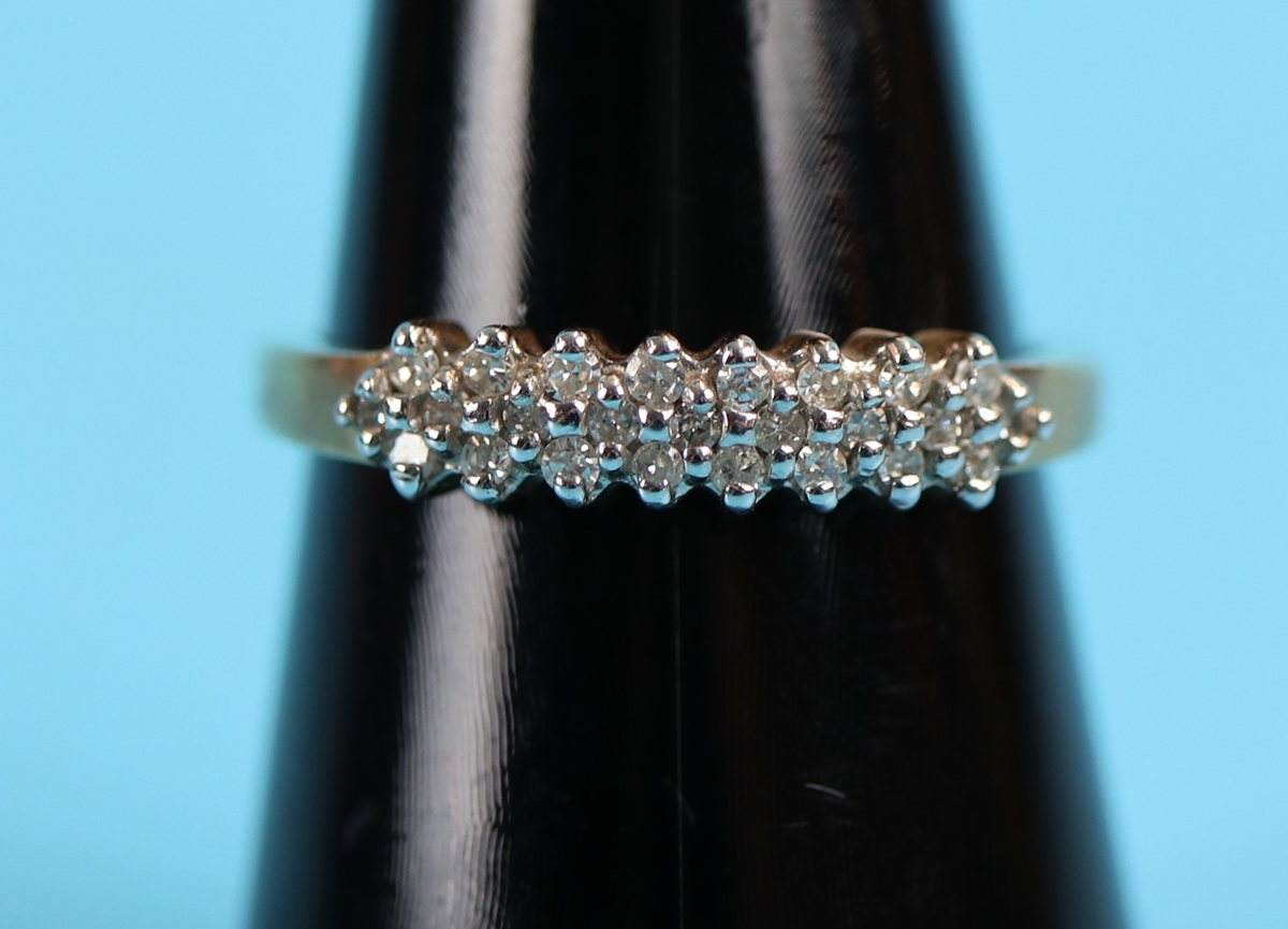 Gold triple row diamond ring