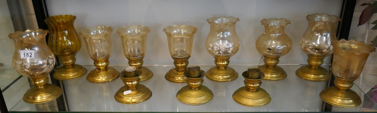 Collection of candle holders and shades