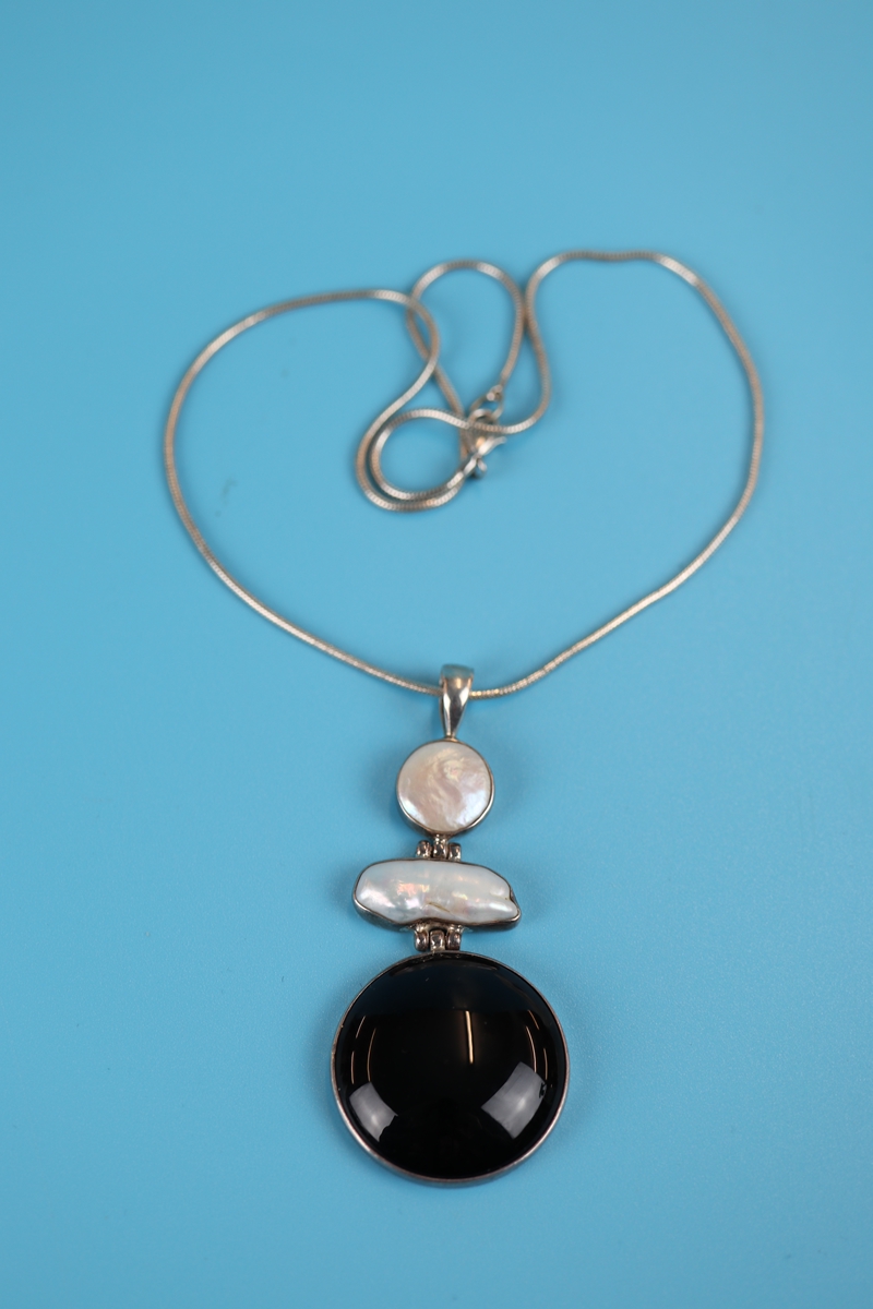 Designer silver pearl & onyx pendant on chain
