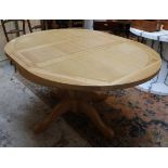 Extending oak dining table by Lee Longlands