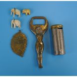 Collectables to include saucy bottle opener and Japanese locket with inscription verso