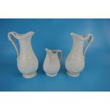 Pair of Copeland antique white jugs and another all with diamond marks to base