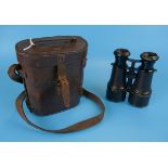 Set of binoculars in leather case