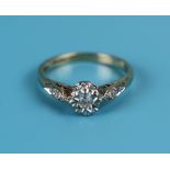 Gold diamond solitaire ring with diamond shoulders