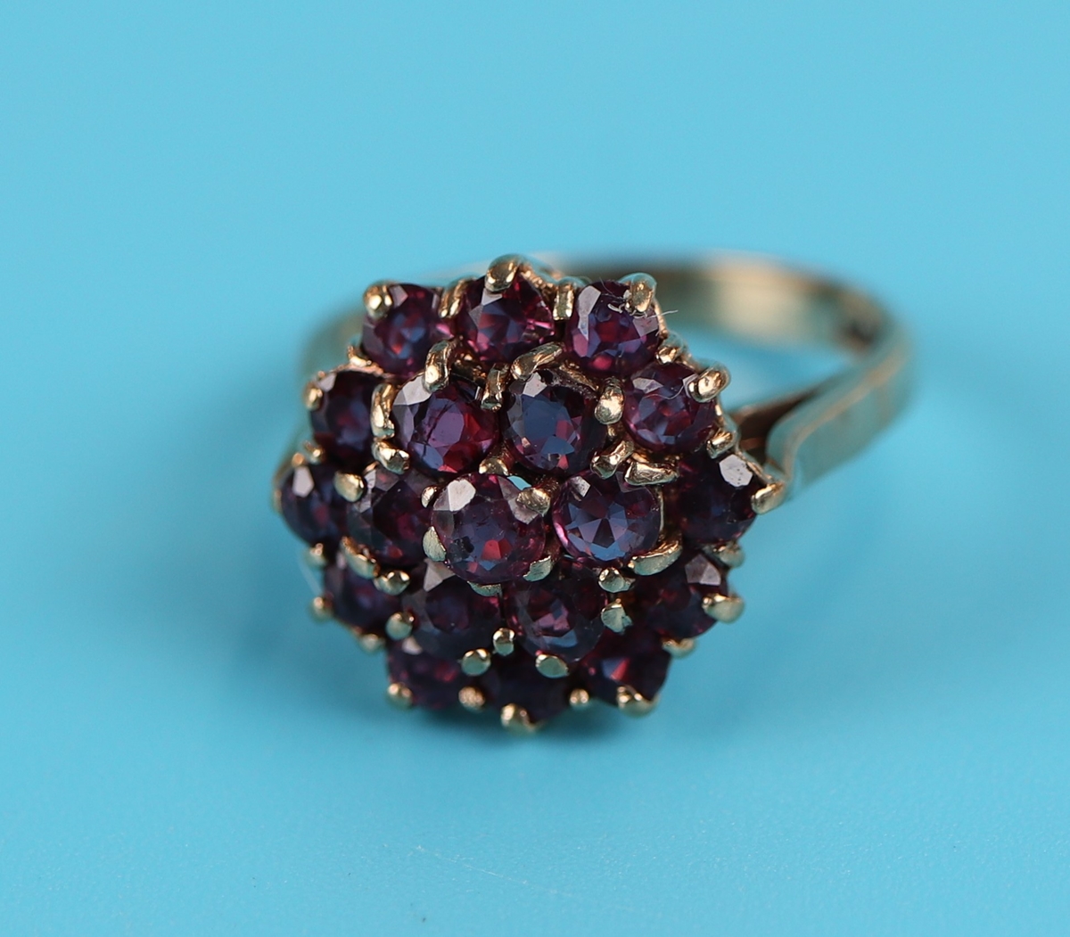 Large gold ruby cluster ring
