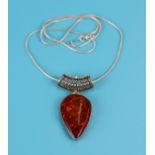 Silver & amber pendant on chain