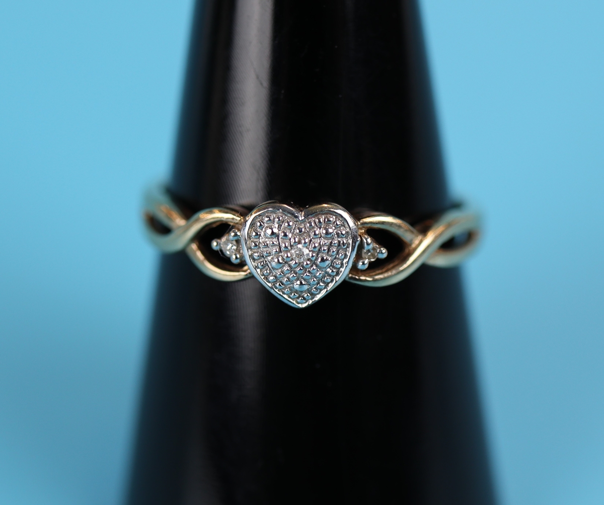 Gold diamond set heart ring