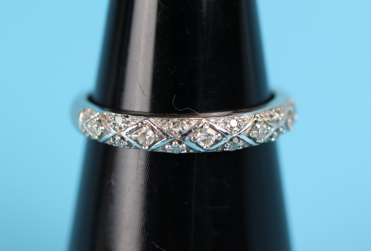 White gold diamond set ring