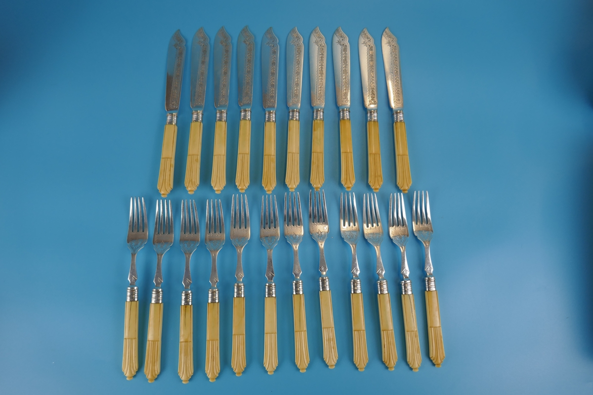 Collection of bone handled flatware with silver collars