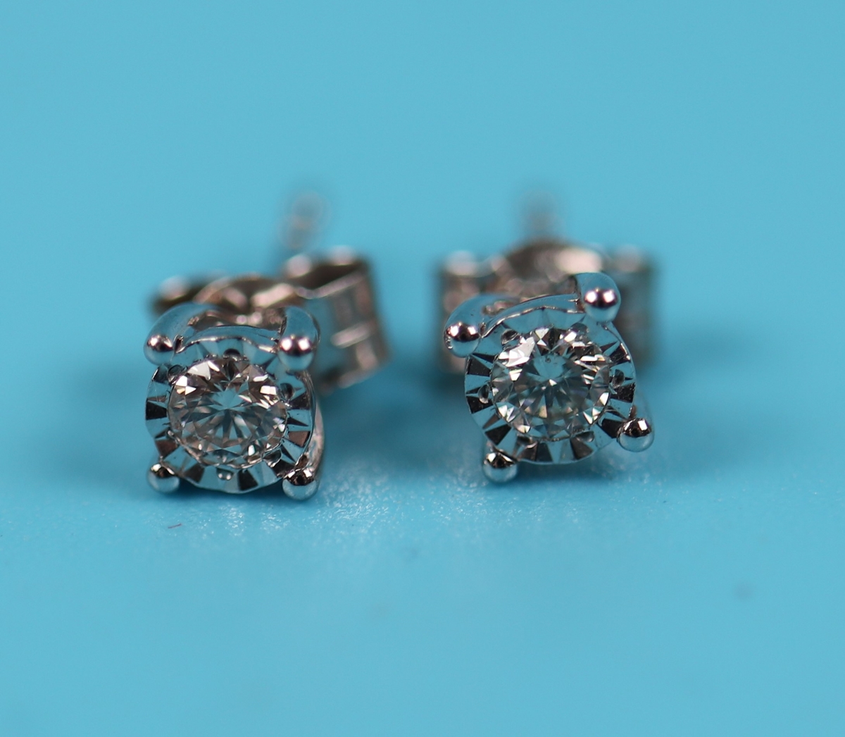 White gold diamond stud earrings