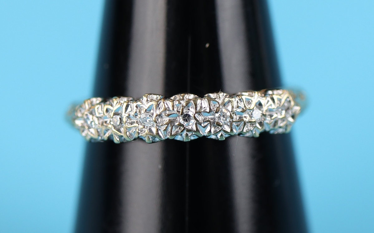 Gold diamond set half hoop ring