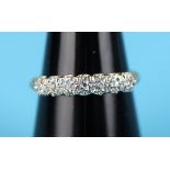 Gold diamond set half hoop ring