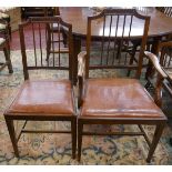 Set of six antique mahogany dining chairs with leather seats to include 2 carvers