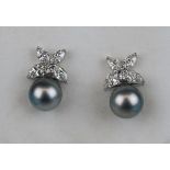 Fine pair of 18ct white gold pearl & diamond earrings