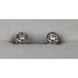 Pair of white gold diamond stud earrings