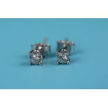 Pair of white gold diamond stud earrings