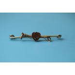 Antique gold riding crop & heart brooch