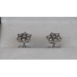 Pair of white gold diamond cluster earrings