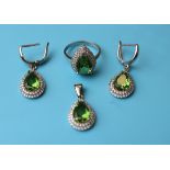Silver topaz set earrings, pendant & ring
