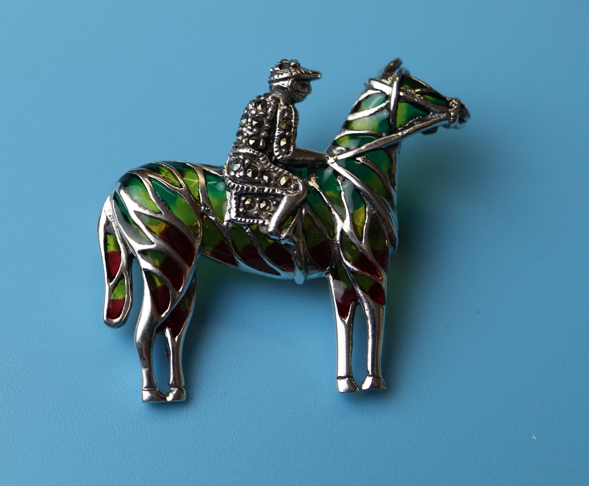 Silver champlevé enamel & marcasite set horse & jockey brooch