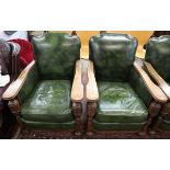 Pair of green leather oak framed club chairs